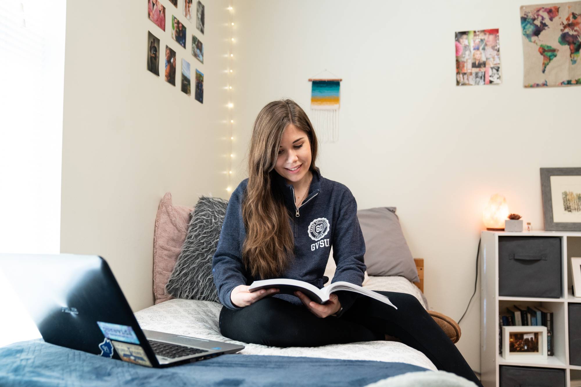 Image of student in a secchia hall room